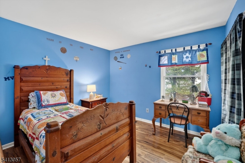 3 Turnburry Road Washington, NJ 07882 - Photo 16 of 24 a bedroom with a bed and a lamp on dresser
