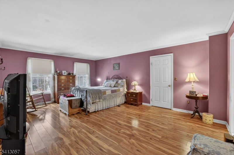 3 Turnburry Road Washington, NJ 07882 - Photo 17 of 24 a bed room with a bed and a large window