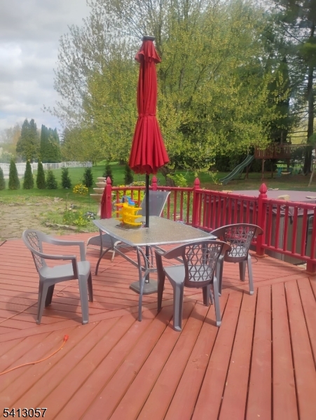 3 Turnburry Road Washington, NJ 07882 - Photo 21 of 24 a view of sitting area with furniture and wooden deck