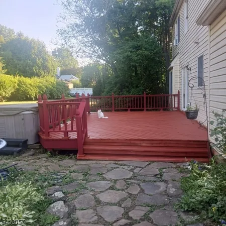 a view of a backyard with sitting area