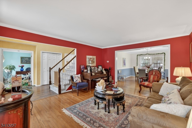3 Turnburry Road Washington, NJ 07882 - Photo 3 of 24 a living room with furniture and a wooden floor