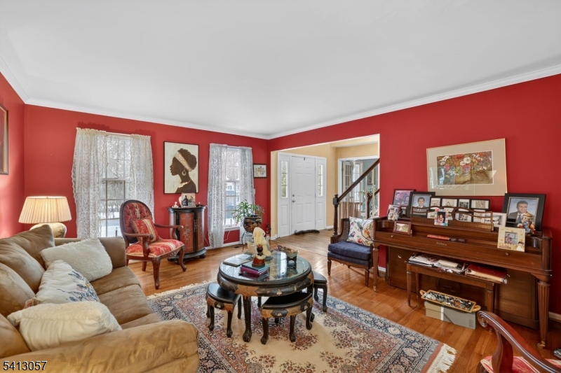 3 Turnburry Road Washington, NJ 07882 - Photo 4 of 24 a living room with furniture a rug and a large window