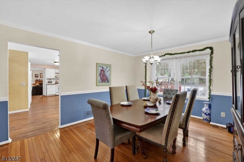 3 Turnburry Road Washington, NJ 07882 - Photo 5 of 24 a view of a dining room with furniture window and wooden floor