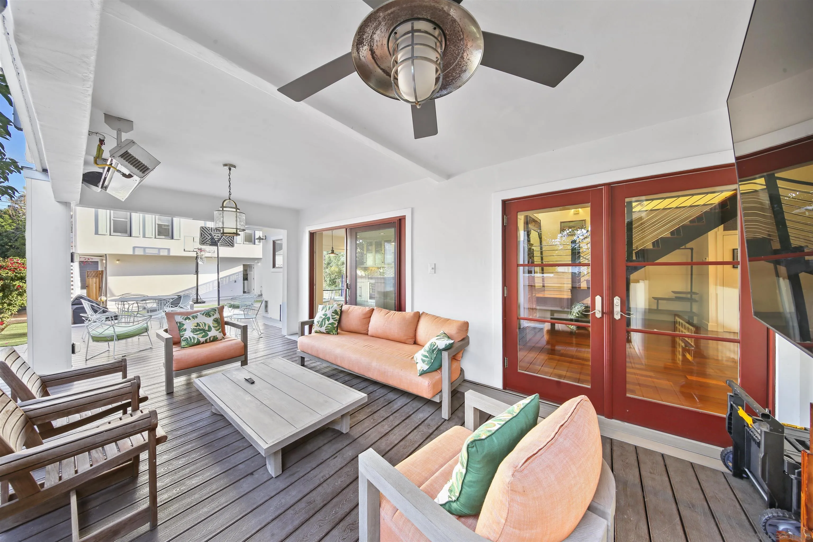 671 B Avenue Coronado, CA 92118 - Photo 12 of 41 a living room with furniture a large window and wooden floor