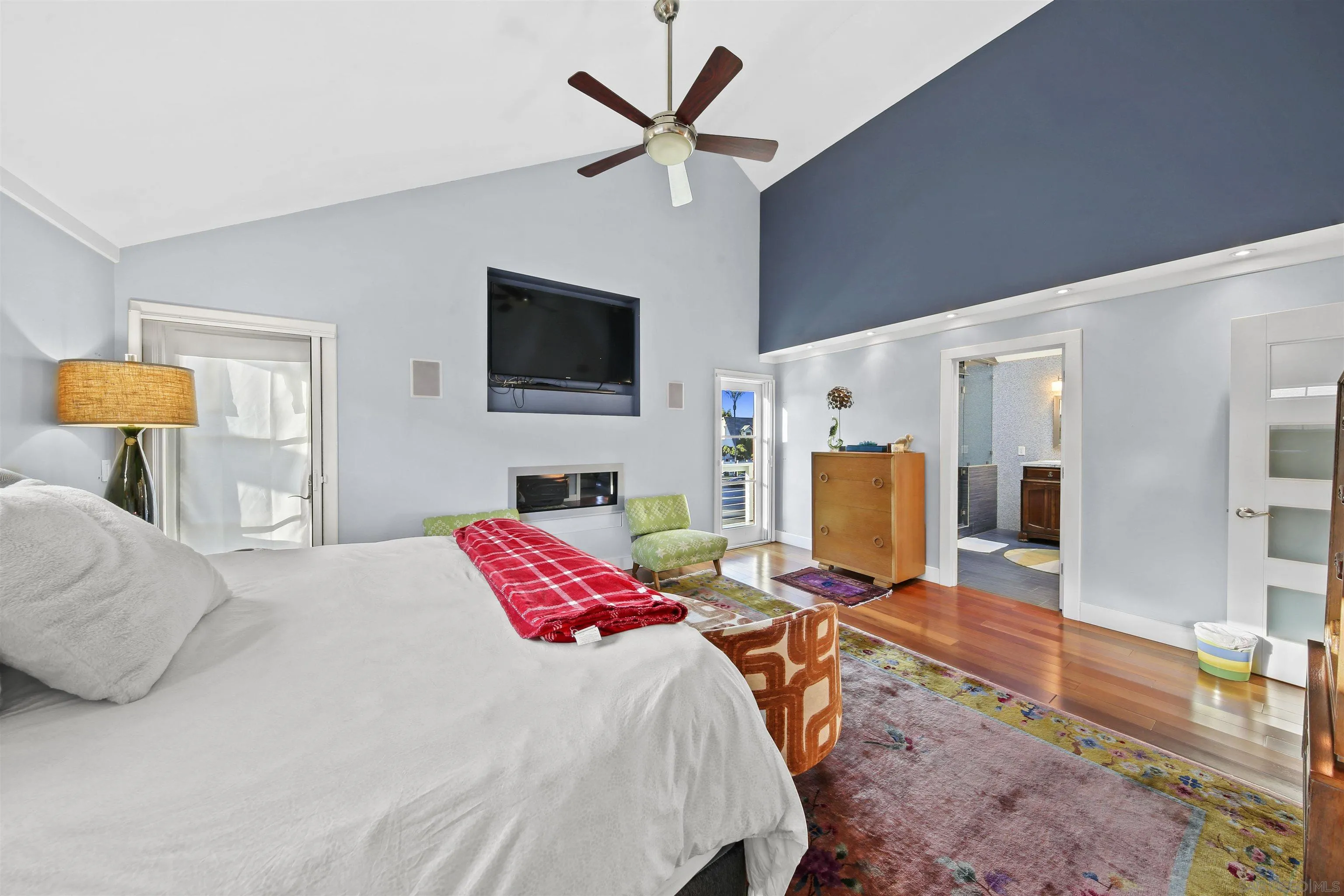 671 B Avenue Coronado, CA 92118 - Photo 16 of 41 a bedroom with a bed and a flat screen tv