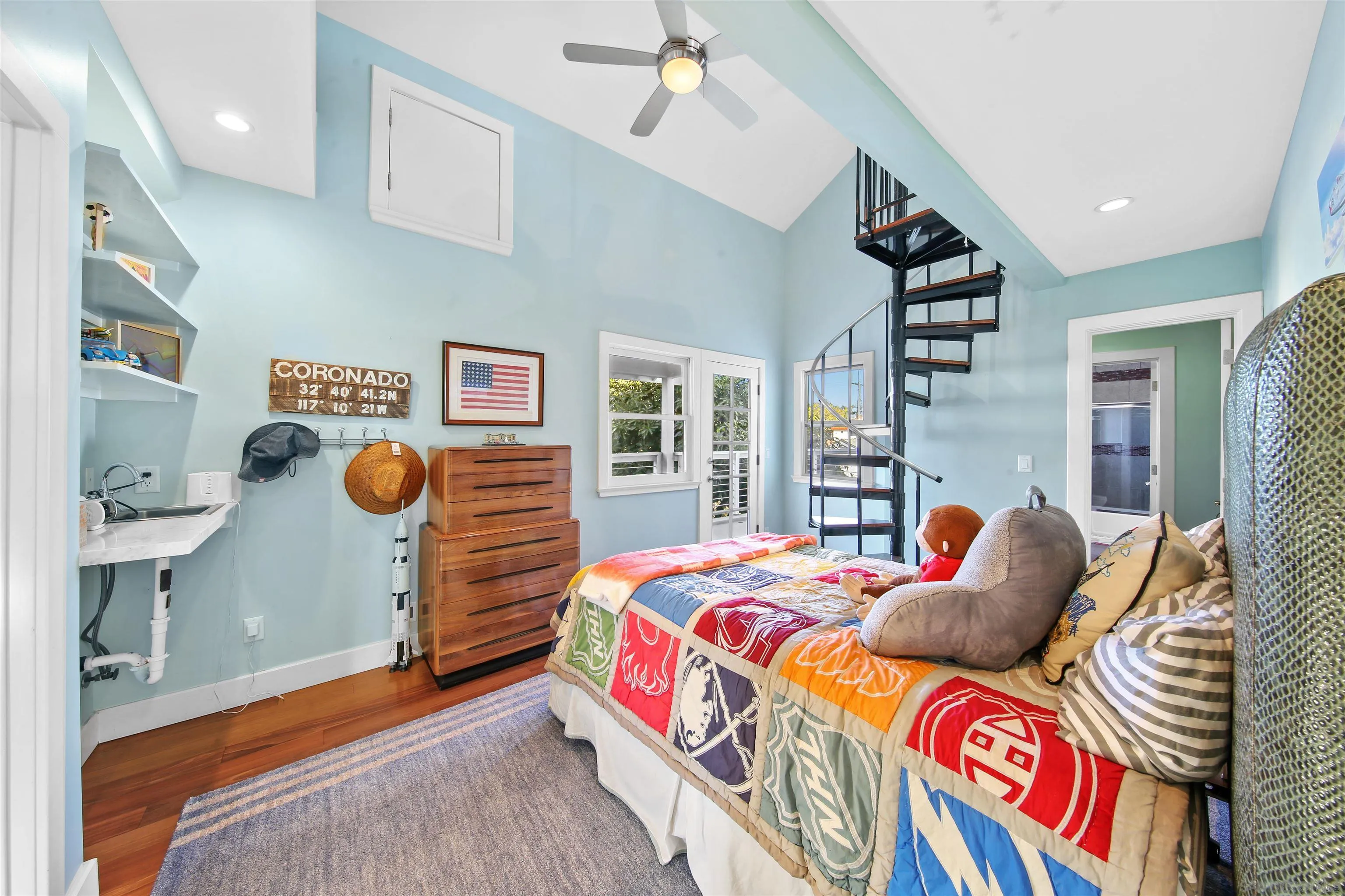 671 B Avenue Coronado, CA 92118 - Photo 20 of 41 a bedroom with a bed and a window