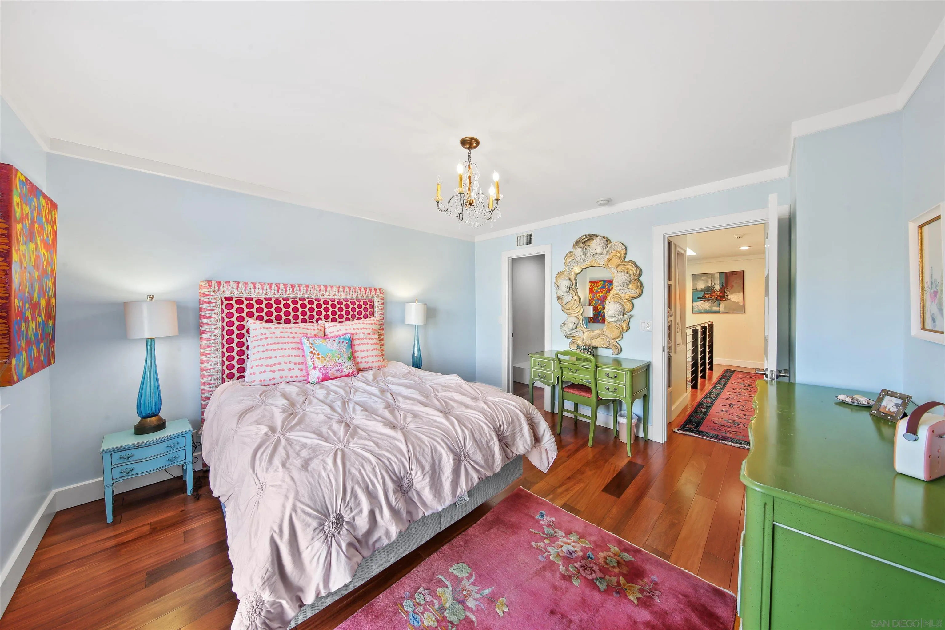 671 B Avenue Coronado, CA 92118 - Photo 24 of 41 a bedroom with a bed table flowerpot and window