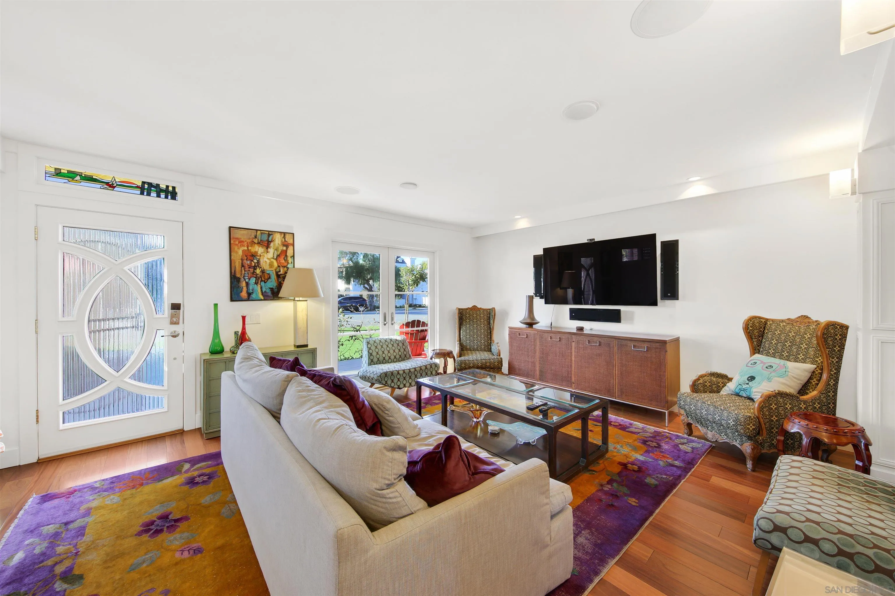 671 B Avenue Coronado, CA 92118 - Photo 3 of 41 a living room with furniture and a flat screen tv