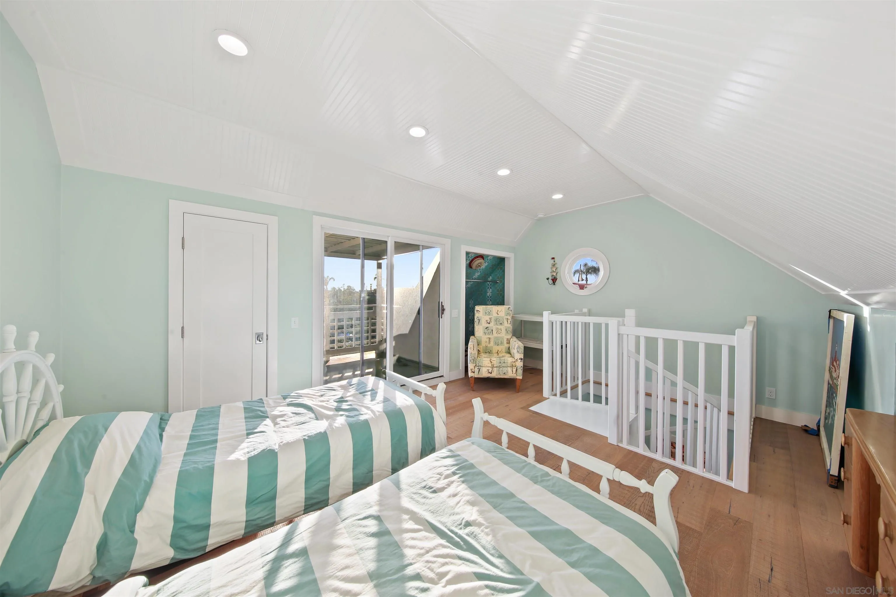 671 B Avenue Coronado, CA 92118 - Photo 34 of 41 a bed room with two beds and a large window