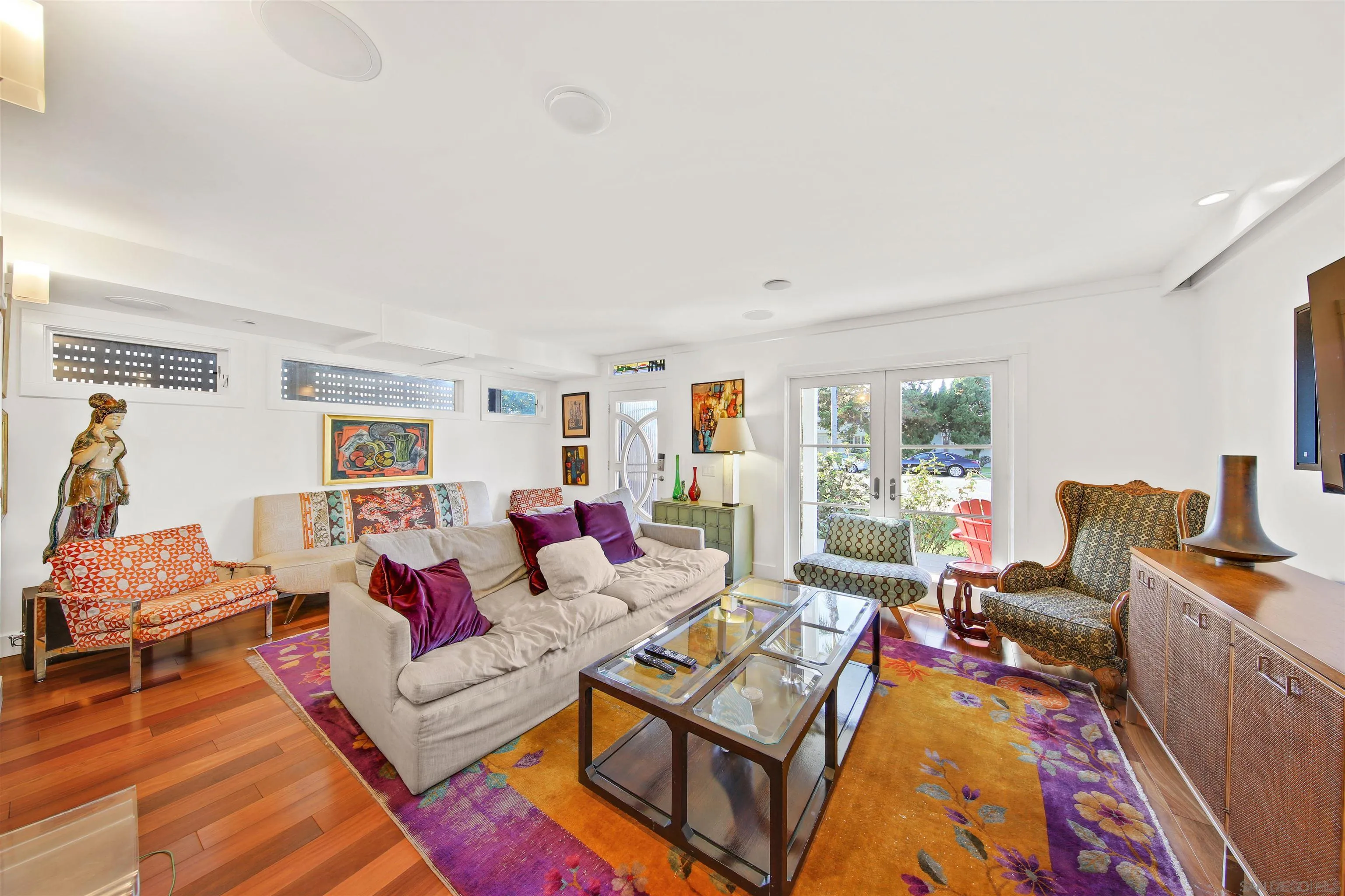 671 B Avenue Coronado, CA 92118 - Photo 4 of 41 a living room with furniture a rug and a lamp