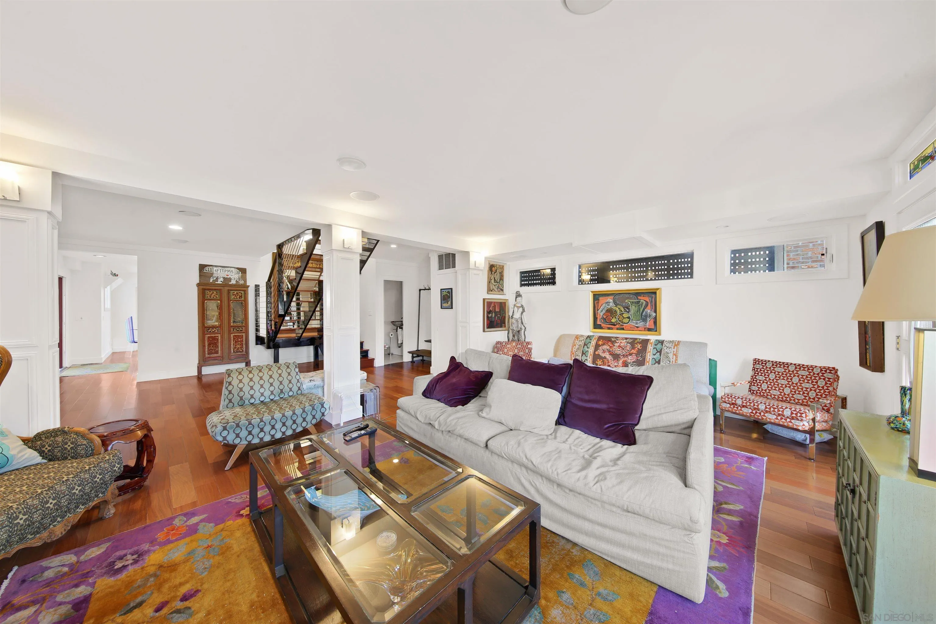 671 B Avenue Coronado, CA 92118 - Photo 5 of 41 a living room with furniture and wooden floor