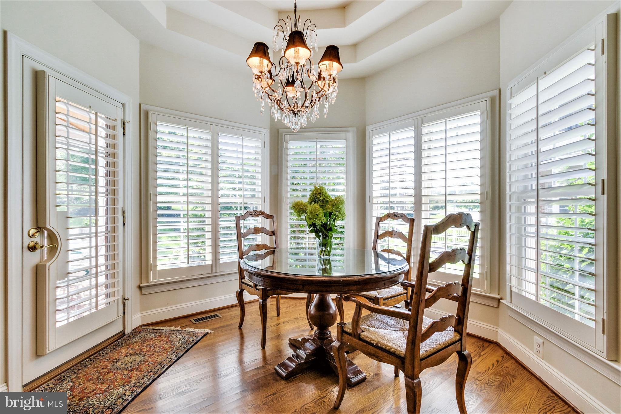 15679 Spyglass Hill Loop Gainesville, VA 20155 - Photo 20 of 86 Sunny Table Space with Stepped Ceiling