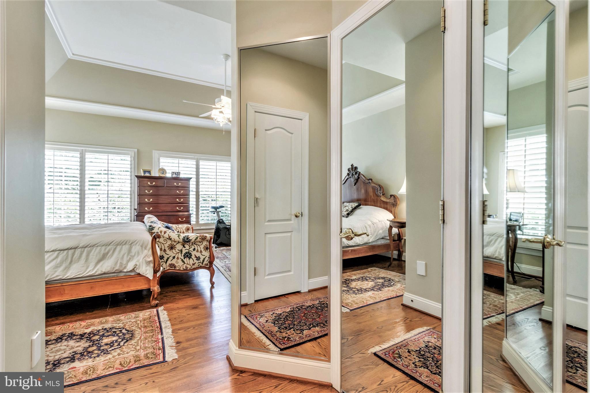 15679 Spyglass Hill Loop Gainesville, VA 20155 - Photo 35 of 86 Mirrored Dressing Area at Dual Walk-in Closets