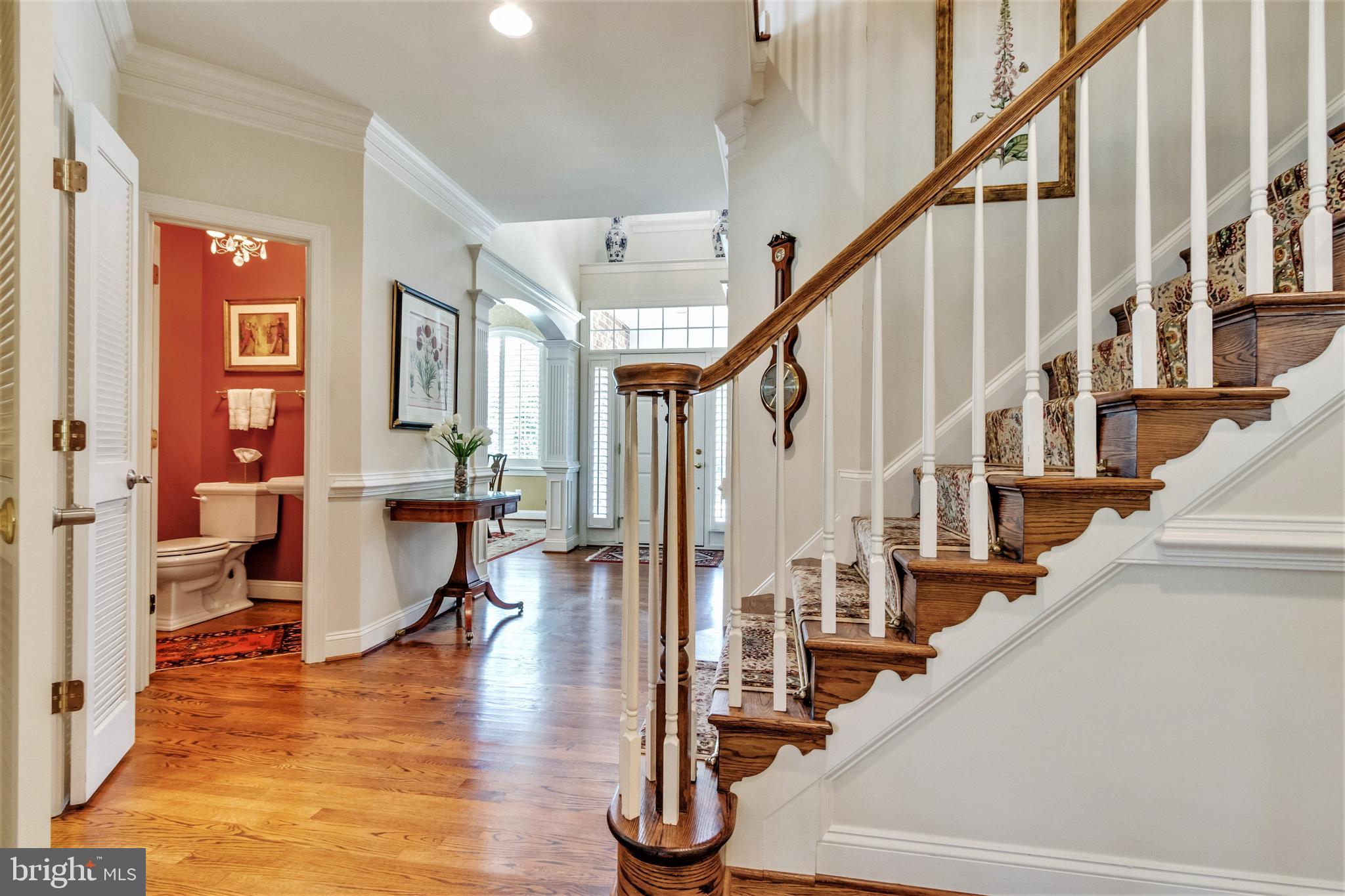 15679 Spyglass Hill Loop Gainesville, VA 20155 - Photo 38 of 86 Centrally Located Staircase to Upper Level