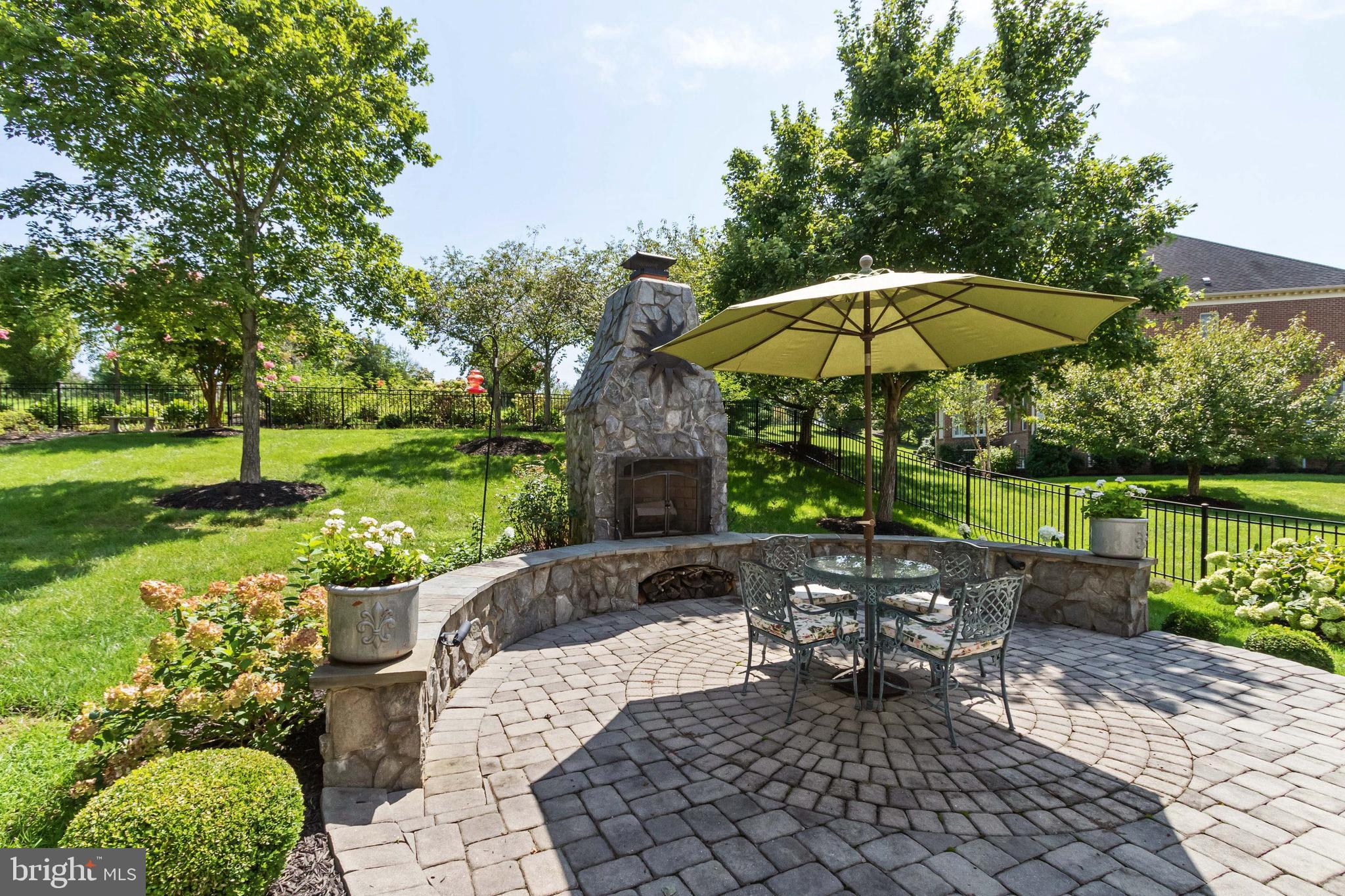 15679 Spyglass Hill Loop Gainesville, VA 20155 - Photo 63 of 86 Large Paver Patio off Screened Porch