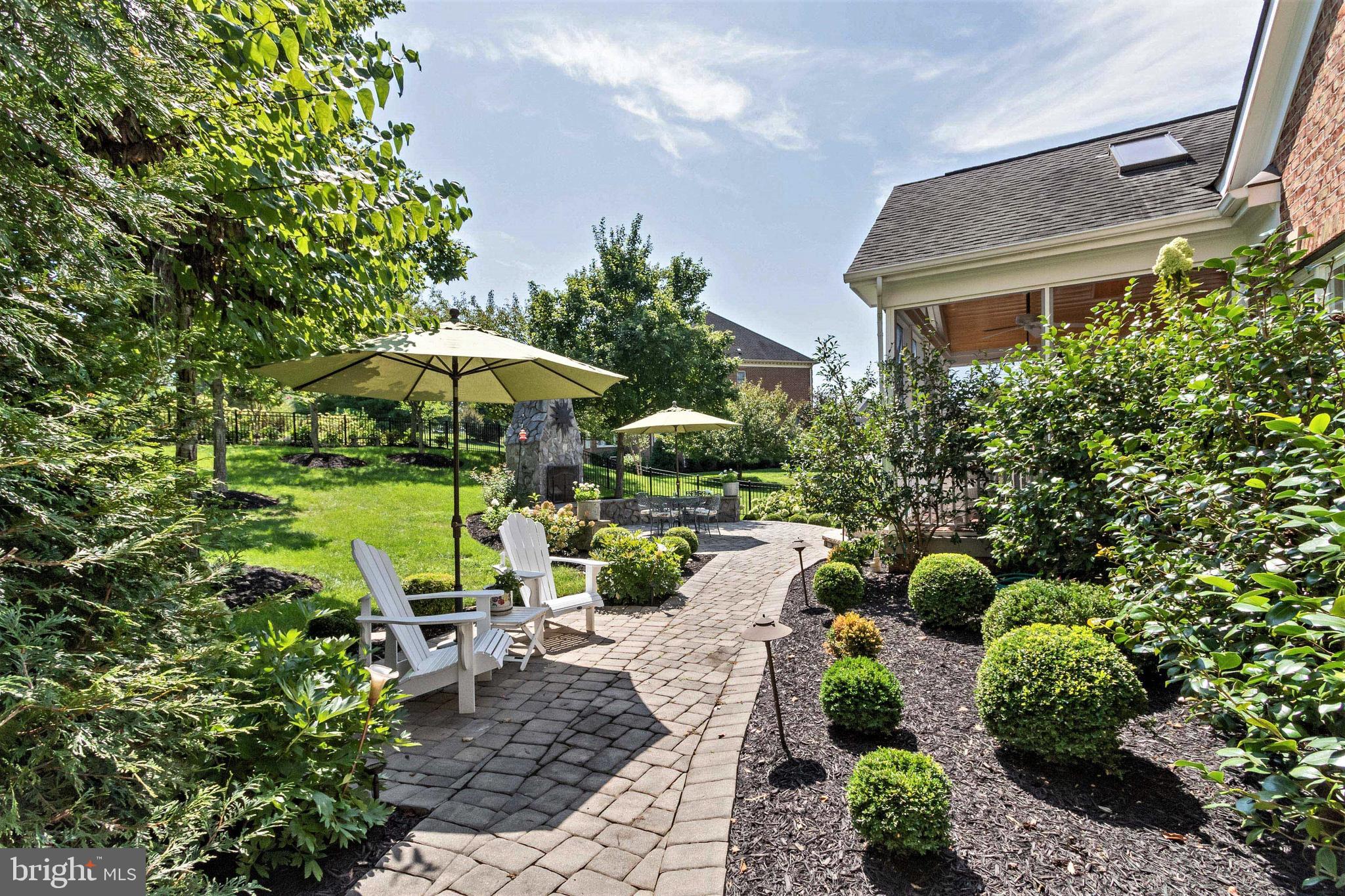 15679 Spyglass Hill Loop Gainesville, VA 20155 - Photo 65 of 86 Side Walkway with Seating Area