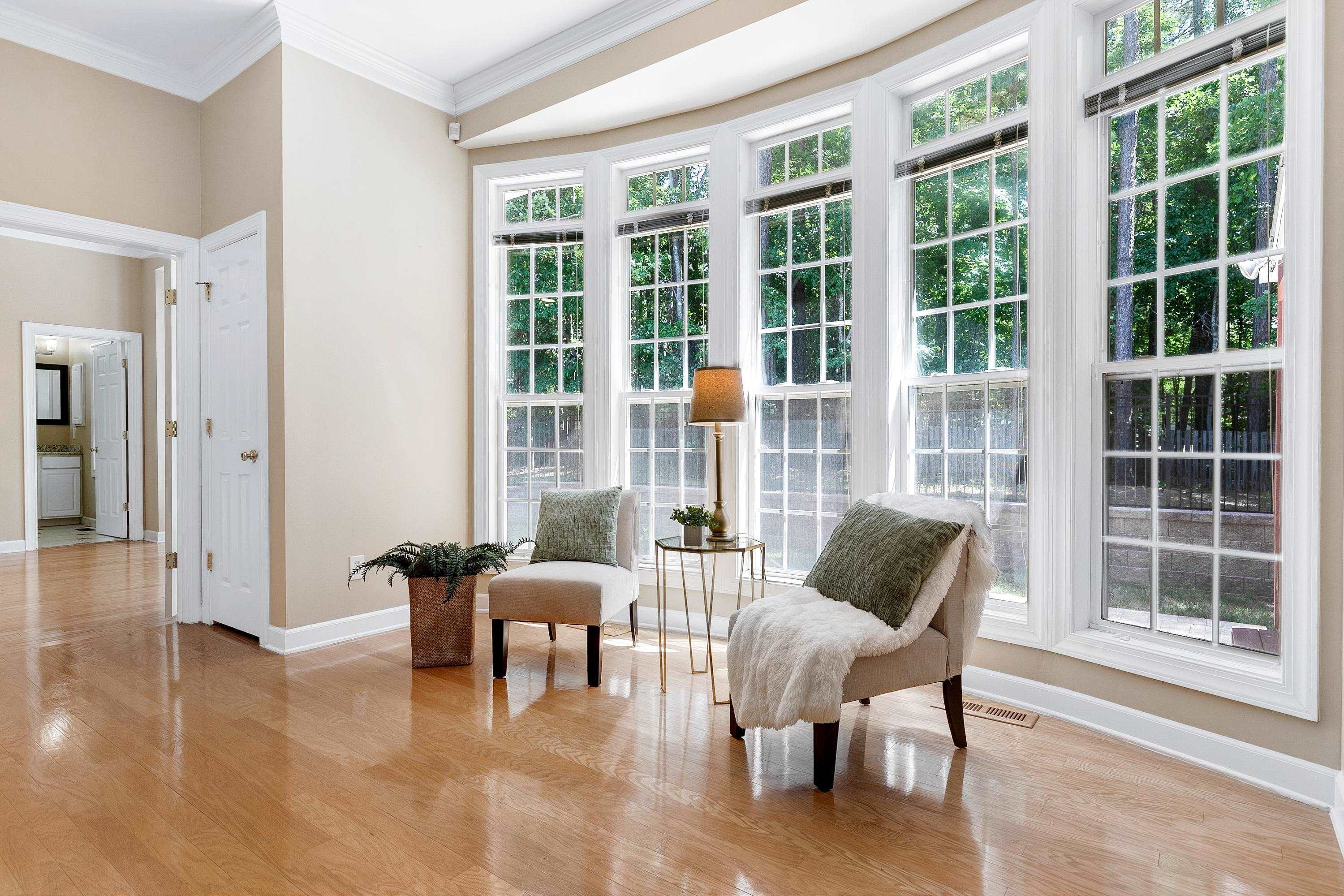 5033 Bartons Enclave Lane Raleigh, NC 27613 - Photo 18 of 58 Light filled extra seating area in the family room.
