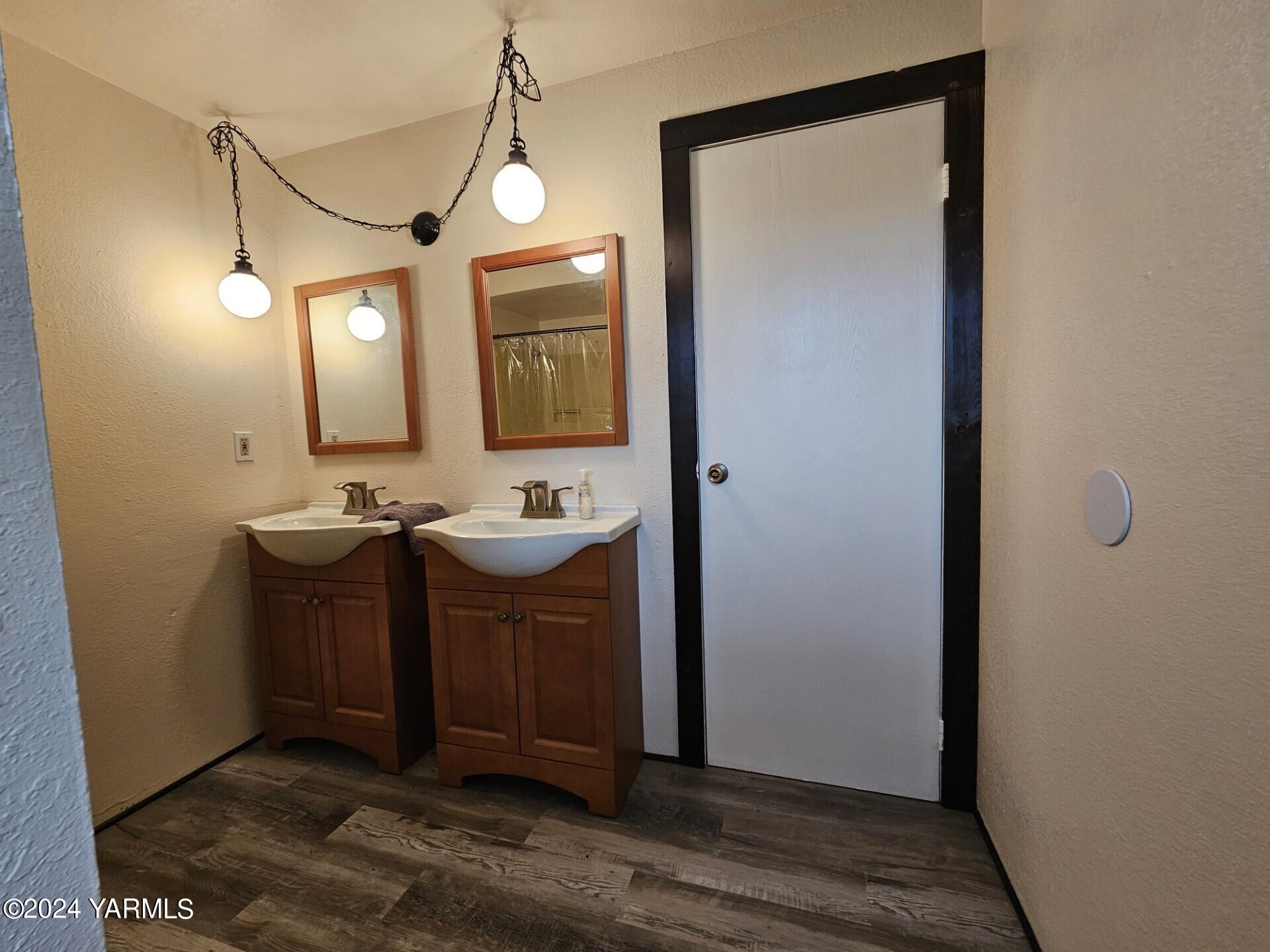 700 Wagoner Road Outlook, WA 98938 - Photo 13 of 29 a bathroom with a sink and a mirror