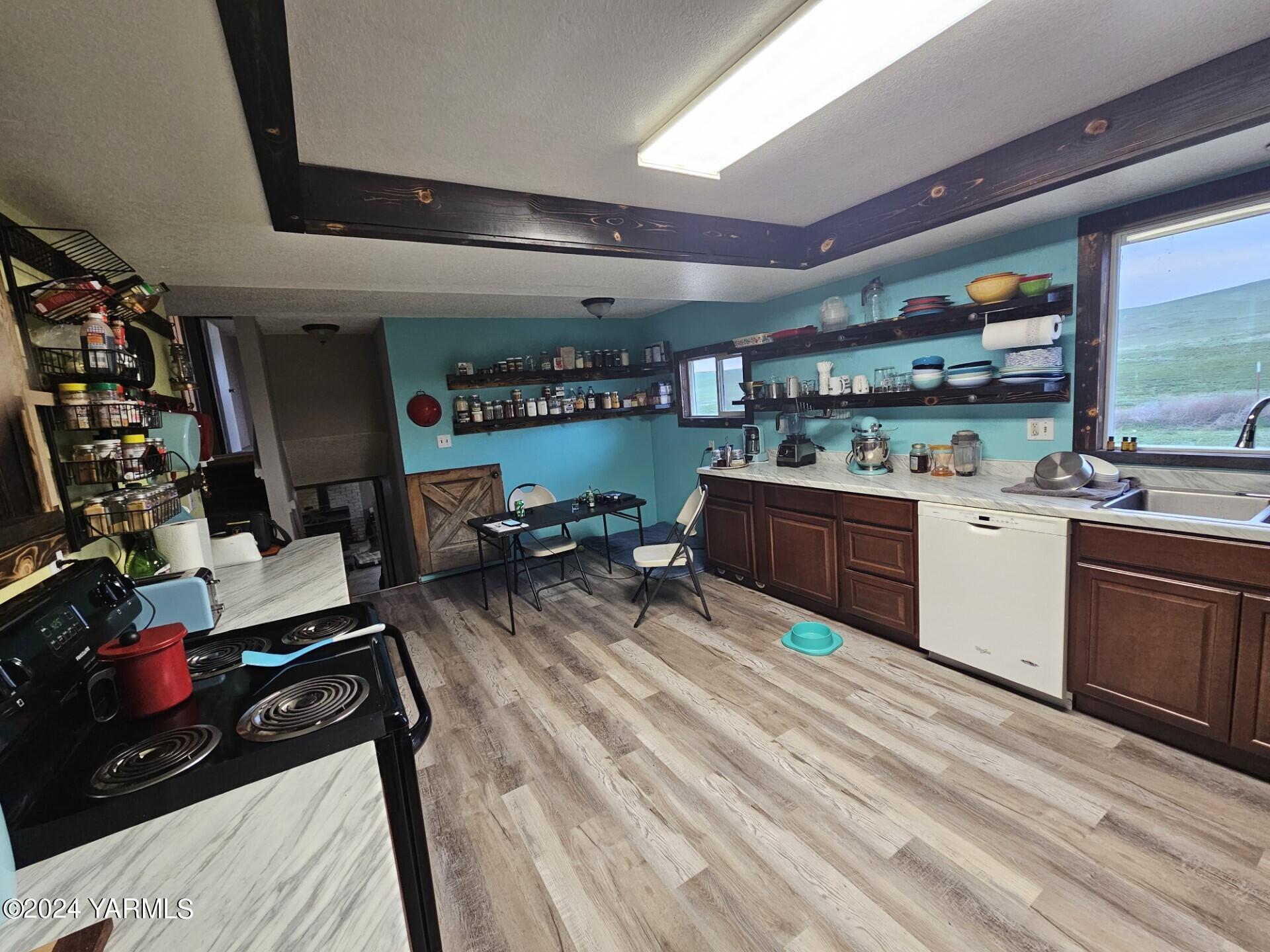 700 Wagoner Road Outlook, WA 98938 - Photo 4 of 29 a kitchen with a sink appliances cabinets and a counter top space