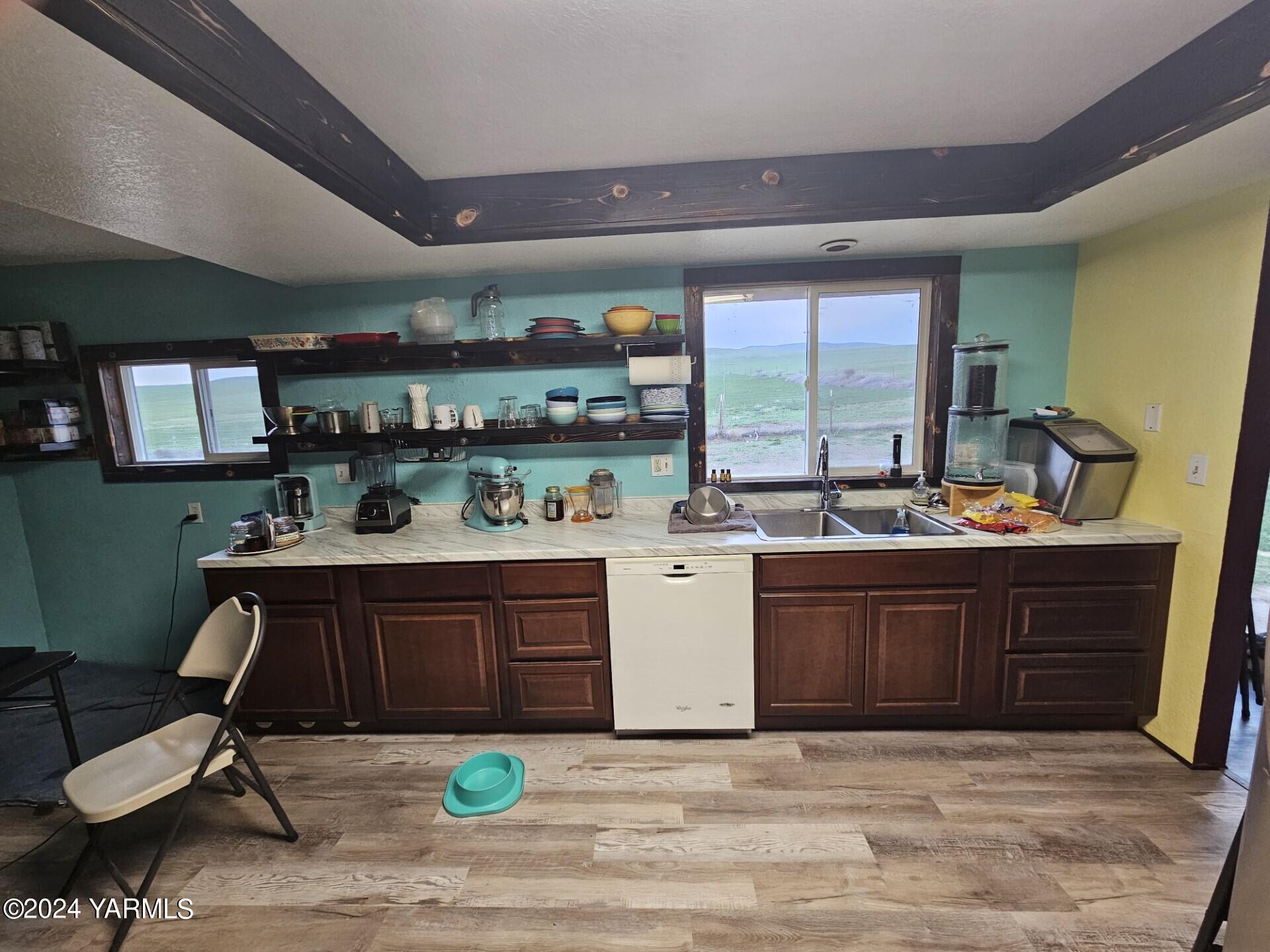 700 Wagoner Road Outlook, WA 98938 - Photo 8 of 29 a kitchen with a sink cabinets and window