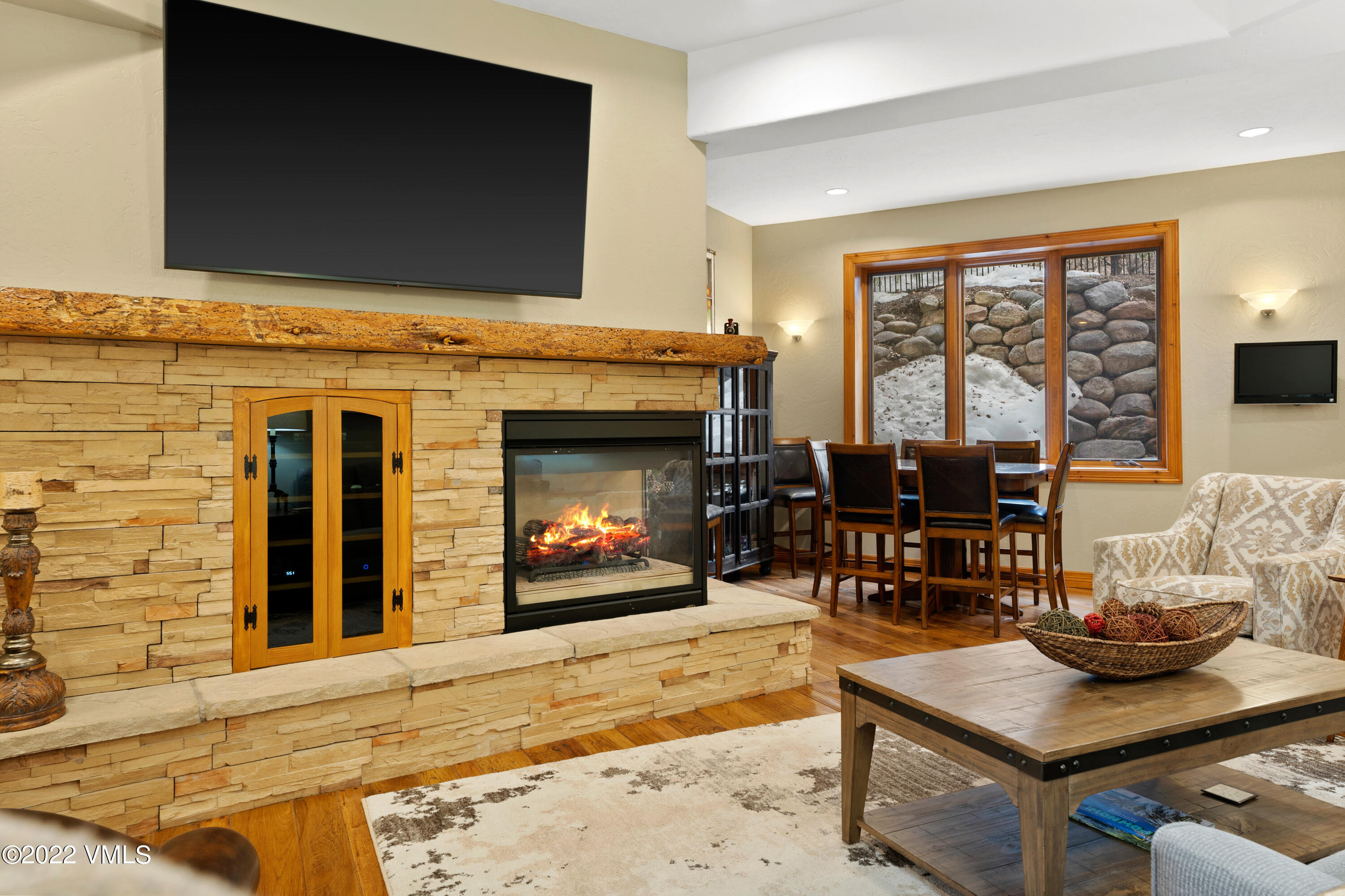 254 Arrowhead Drive, Unit B Edwards, CO 81632 - Photo 15 of 45 a living room with fireplace furniture and a flat screen tv