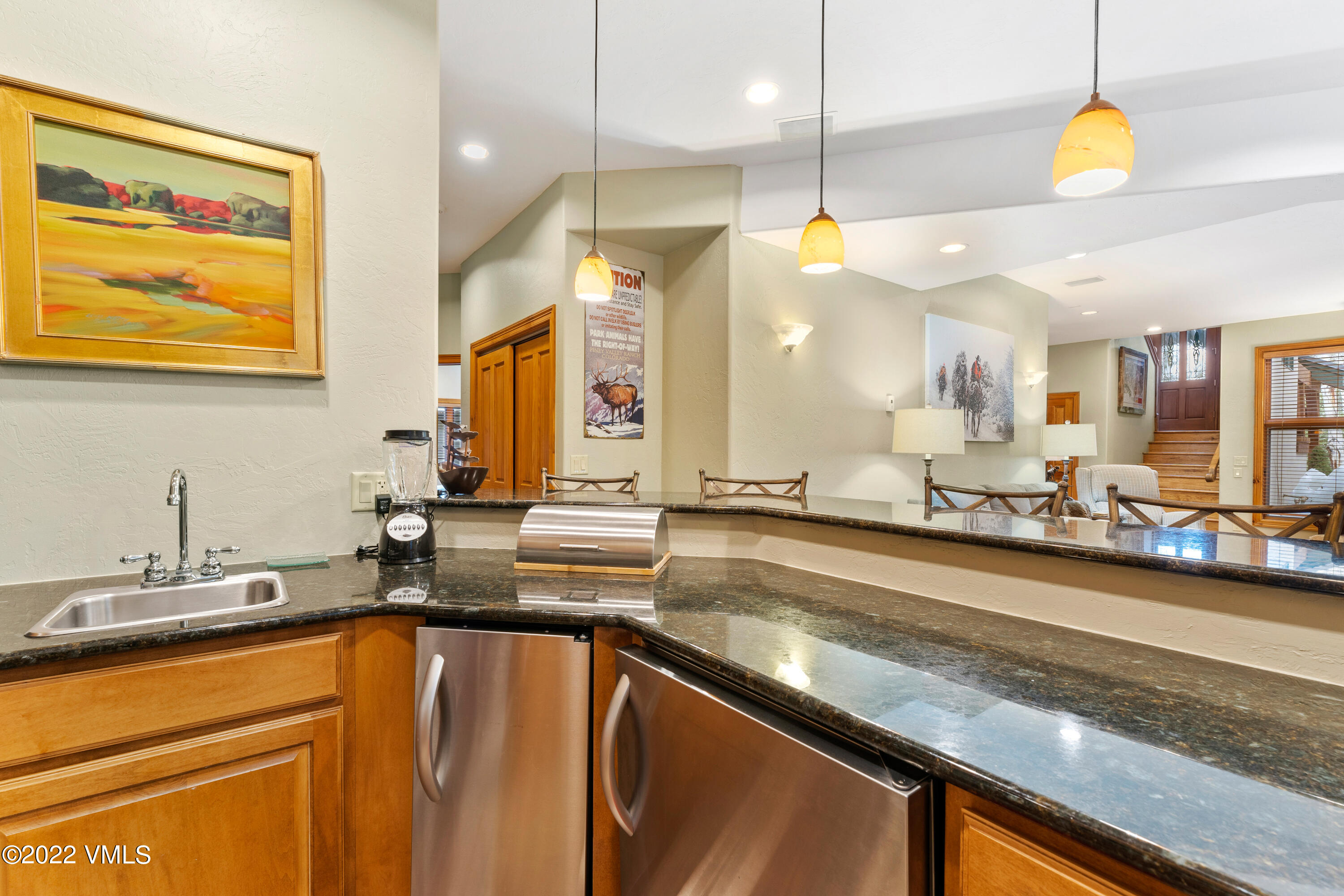 254 Arrowhead Drive, Unit B Edwards, CO 81632 - Photo 20 of 45 a bathroom with a sink a counter and a mirror