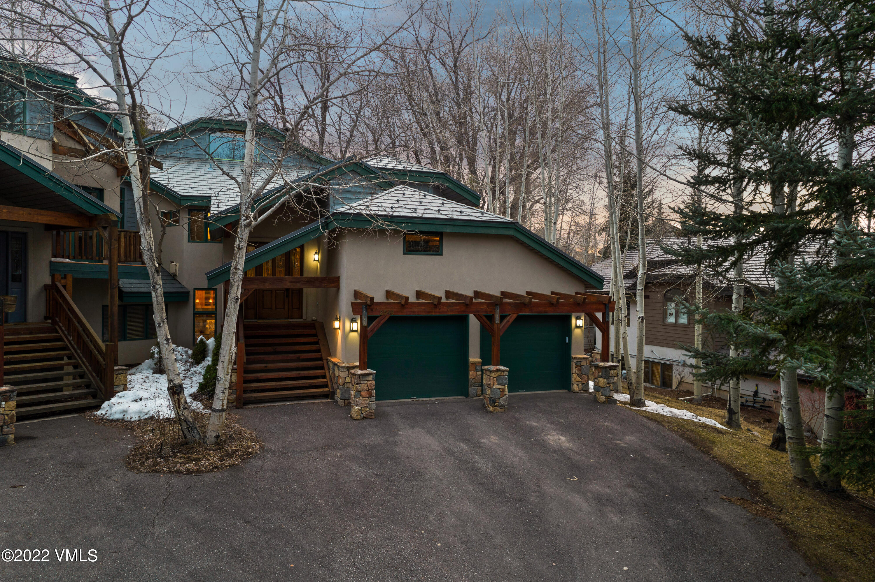 254 Arrowhead Drive, Unit B Edwards, CO 81632 - Photo 2 of 45 a view of a house with a garage