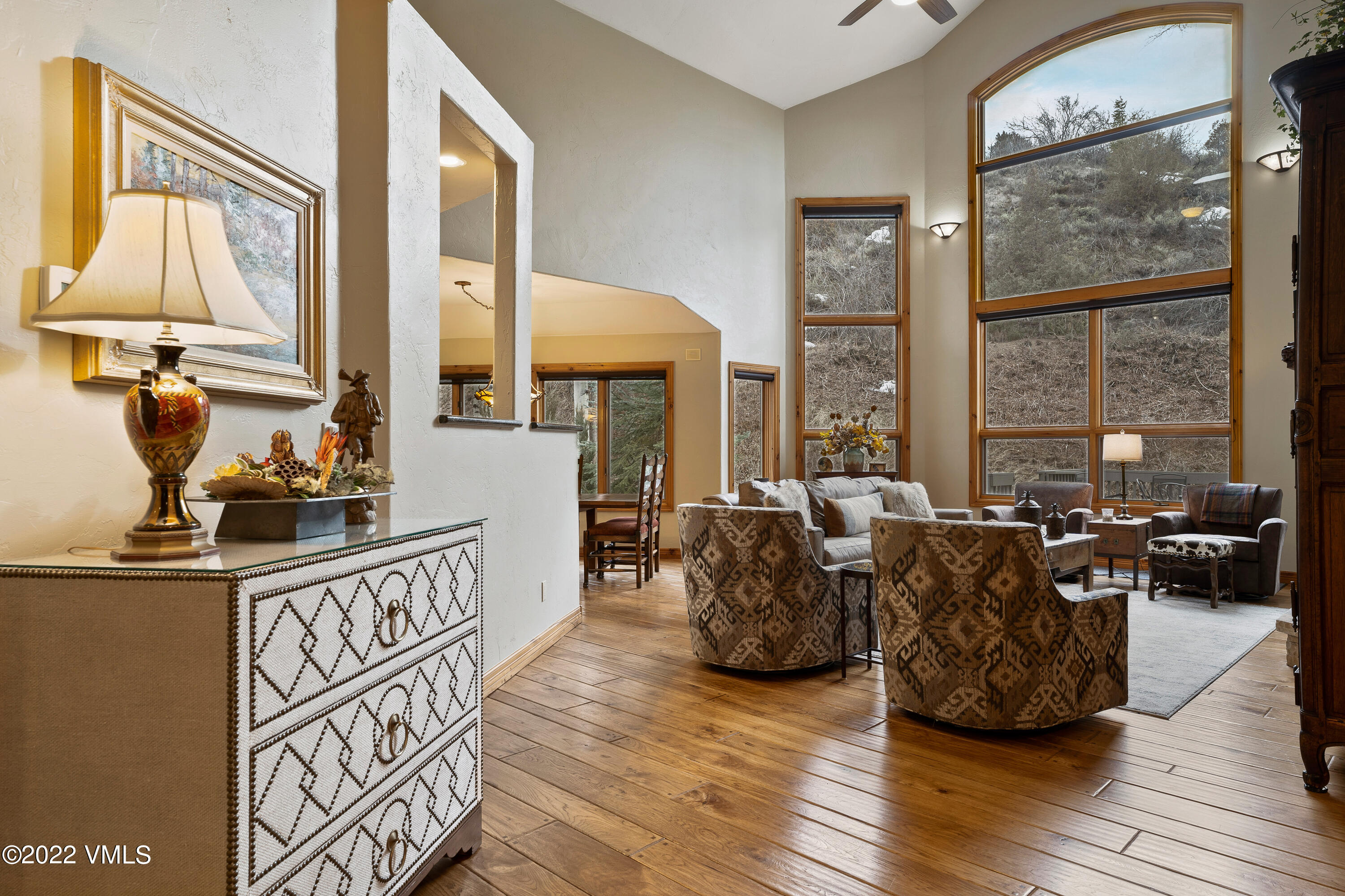 254 Arrowhead Drive, Unit B Edwards, CO 81632 - Photo 3 of 45 a living room with furniture and large windows