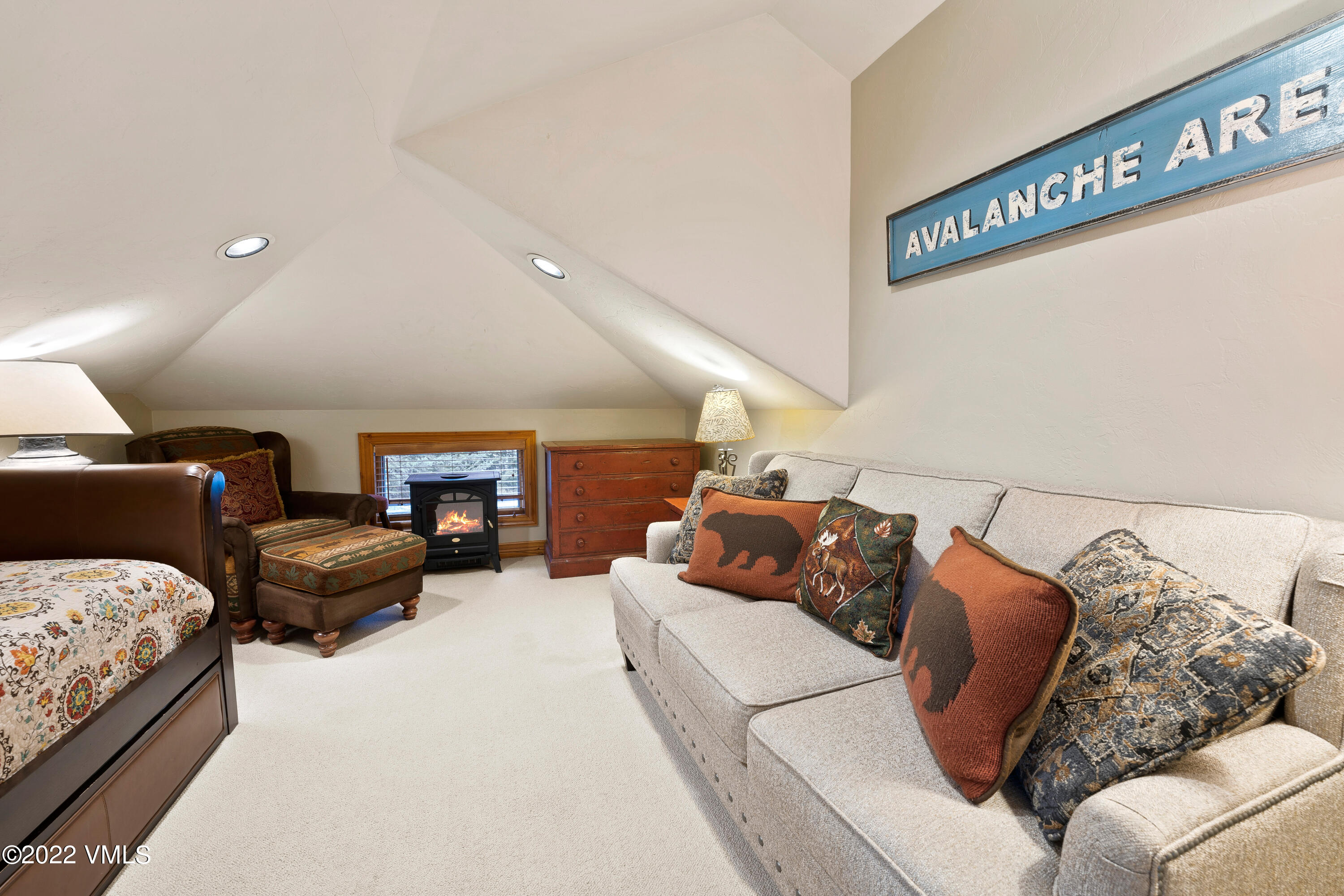 254 Arrowhead Drive, Unit B Edwards, CO 81632 - Photo 38 of 45 a living room with furniture and a couch