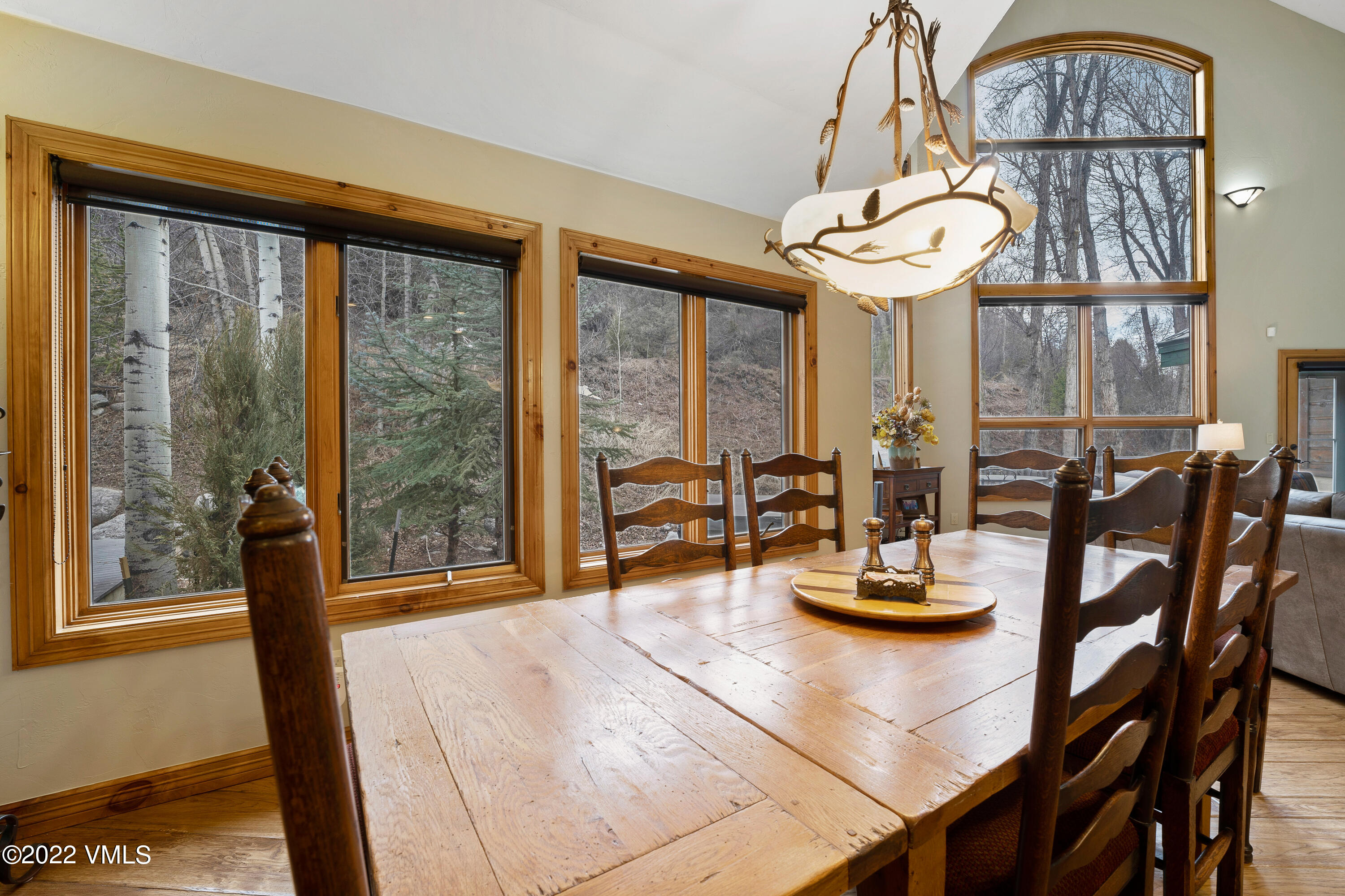 254 Arrowhead Drive, Unit B Edwards, CO 81632 - Photo 40 of 45 a view of a dining room with furniture window and outside view