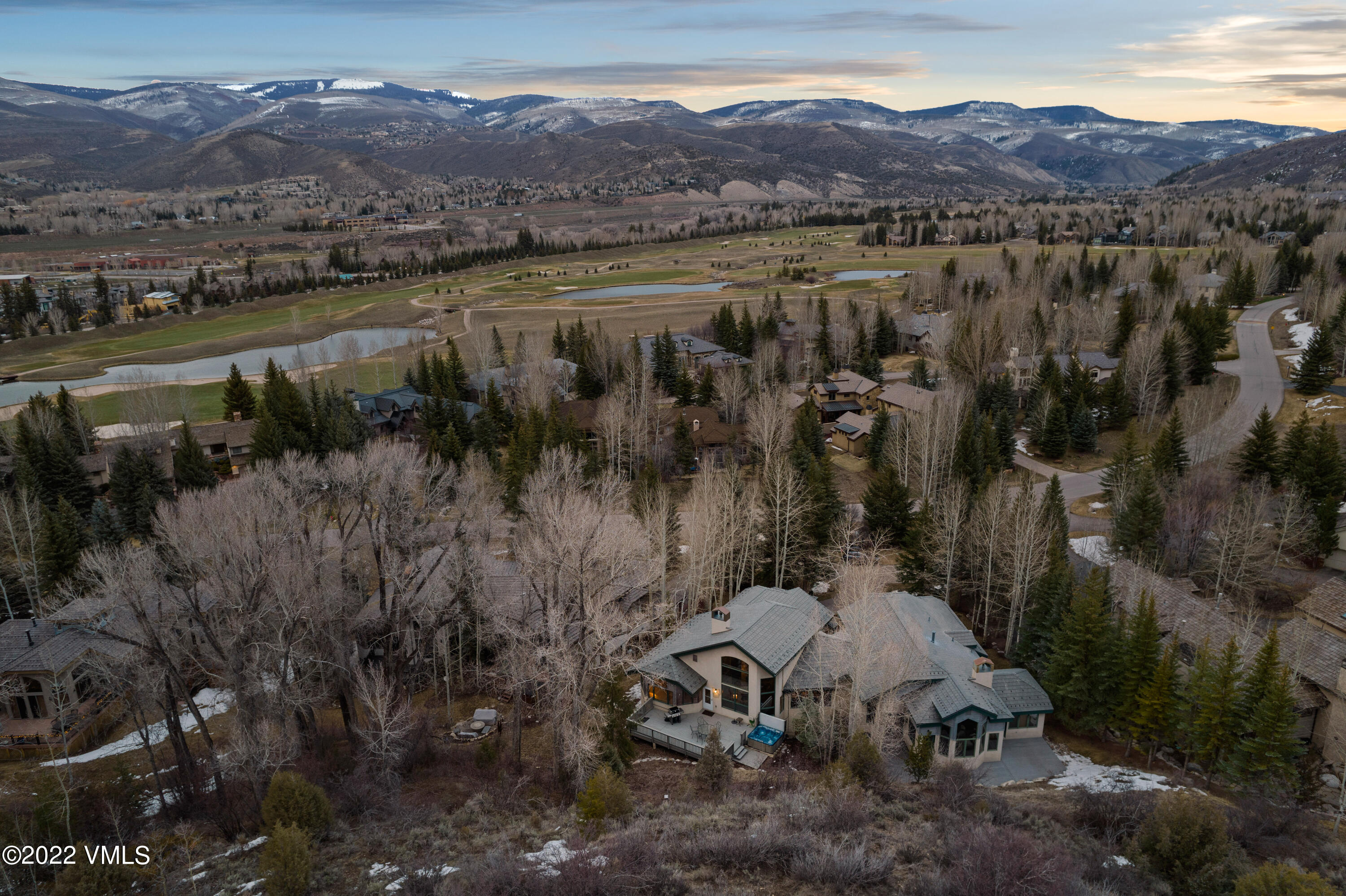 254 Arrowhead Drive, Unit B Edwards, CO 81632 - Photo 43 of 45 a view of a town with mountains in the background