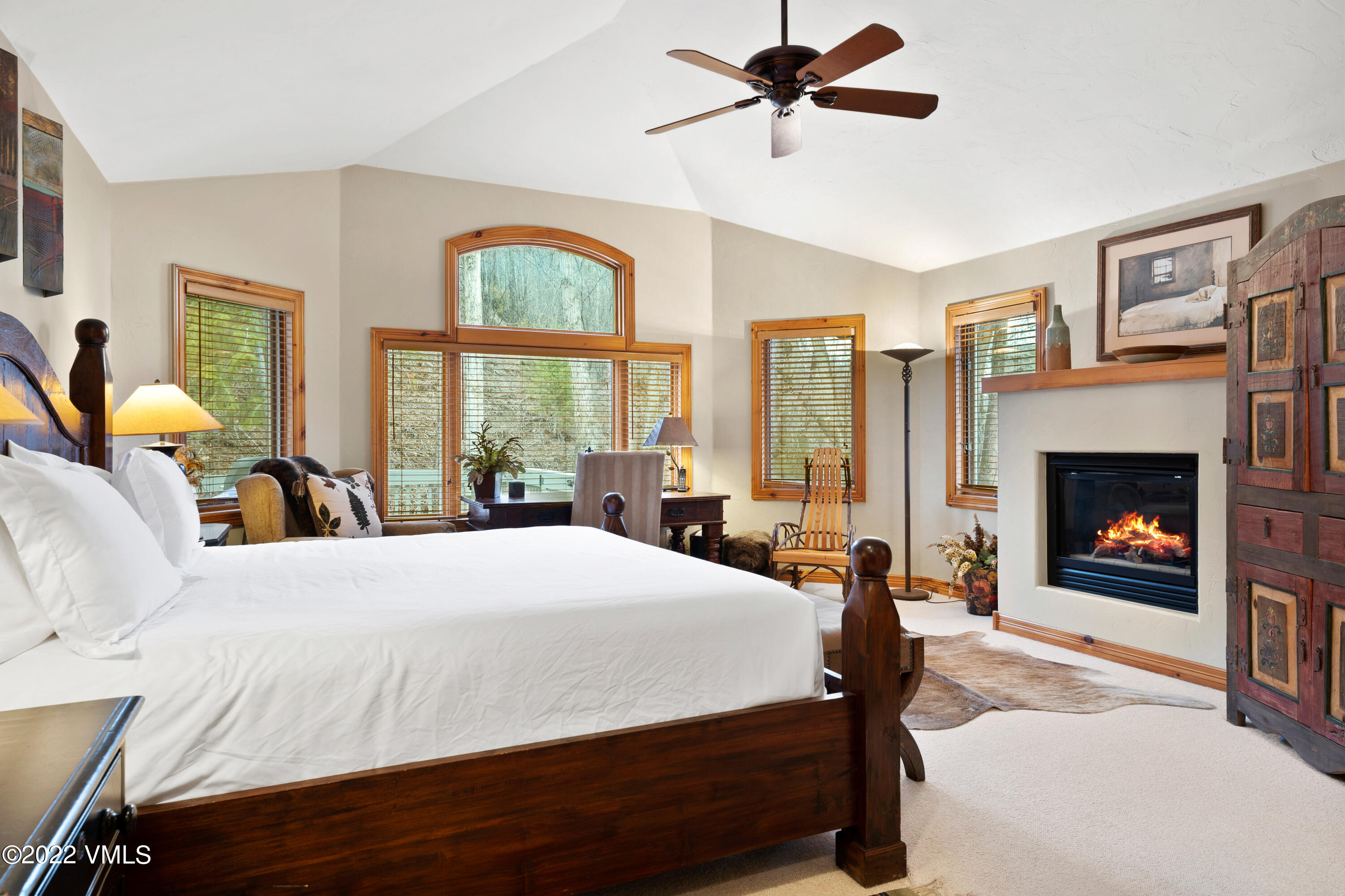 254 Arrowhead Drive, Unit B Edwards, CO 81632 - Photo 5 of 45 a bed room with a bed and a fireplace