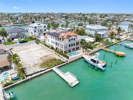a view of a city with lawn chairs