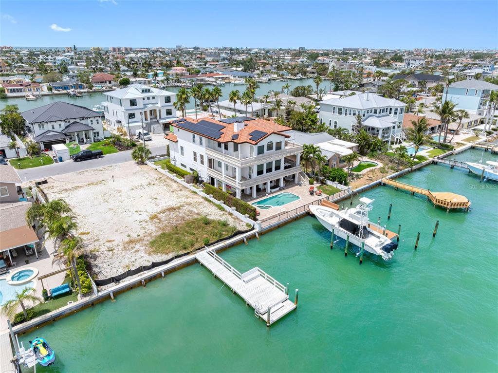11285 9th Street East Treasure Island, FL 33706 - Photo 15 of 30 an aerial view of a house with a big yard