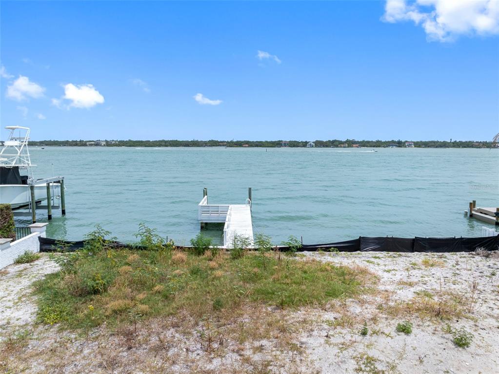11285 9th Street East Treasure Island, FL 33706 - Photo 20 of 30 a view of a lake from a yard