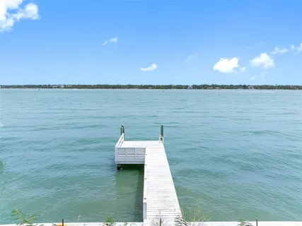 a view of a lake with a house