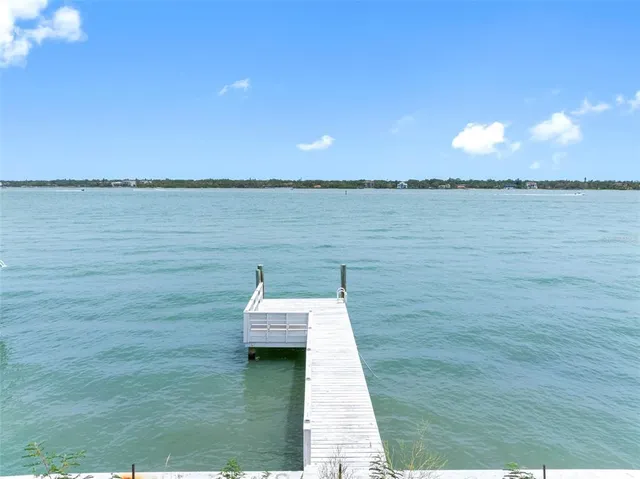a view of a lake with a house