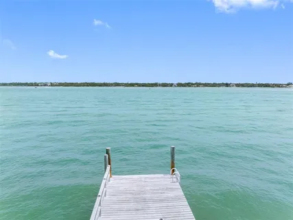 a view of a lake from a yard