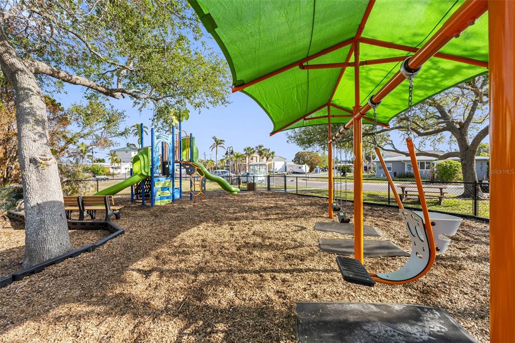 11285 9th Street East Treasure Island, FL 33706 - Photo 27 of 30 a view of a park with slide
