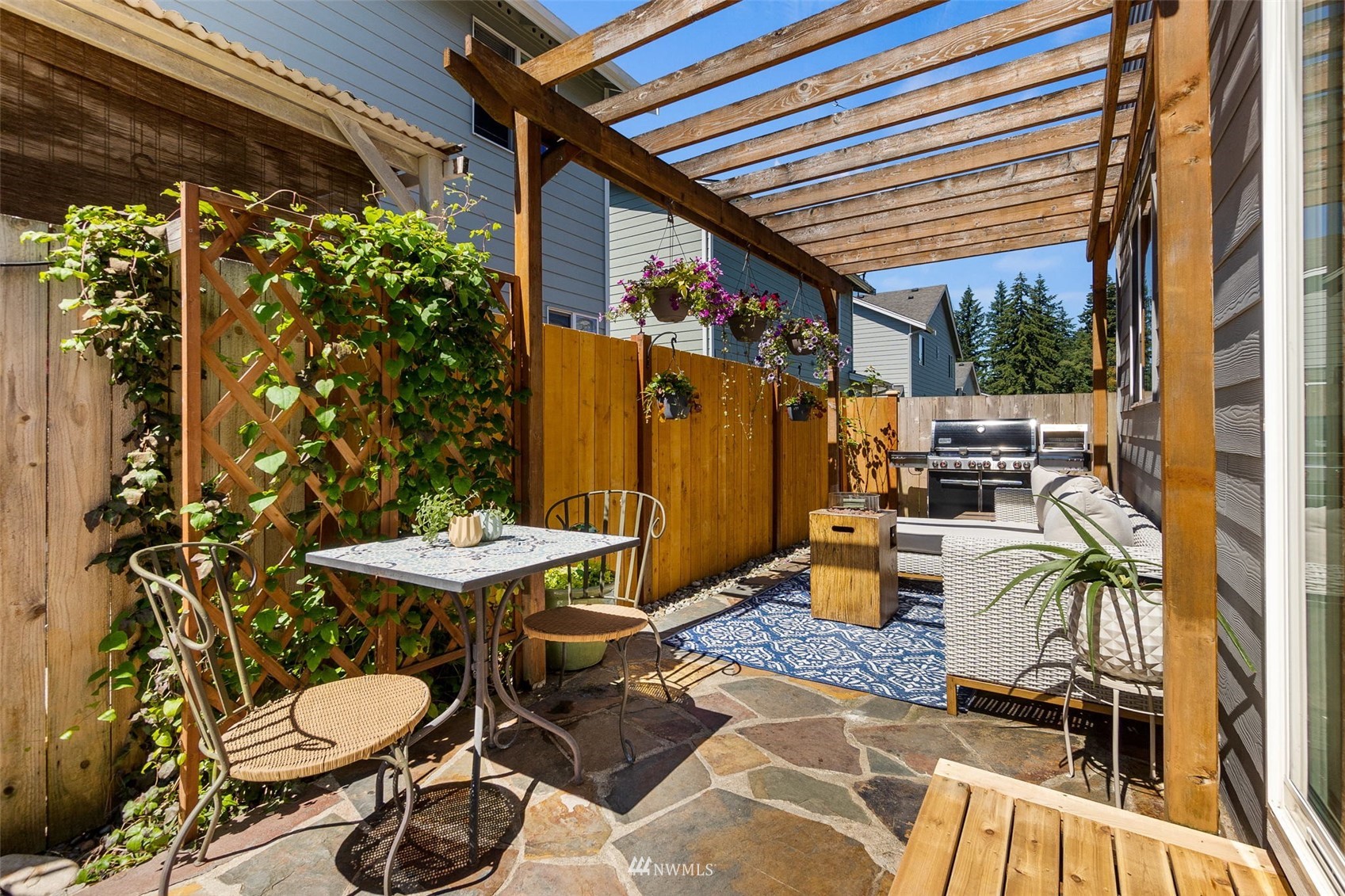1016 186th Street Southeast Bothell, WA 98012 - Photo 12 of 26 a view of a chairs and table in a patio