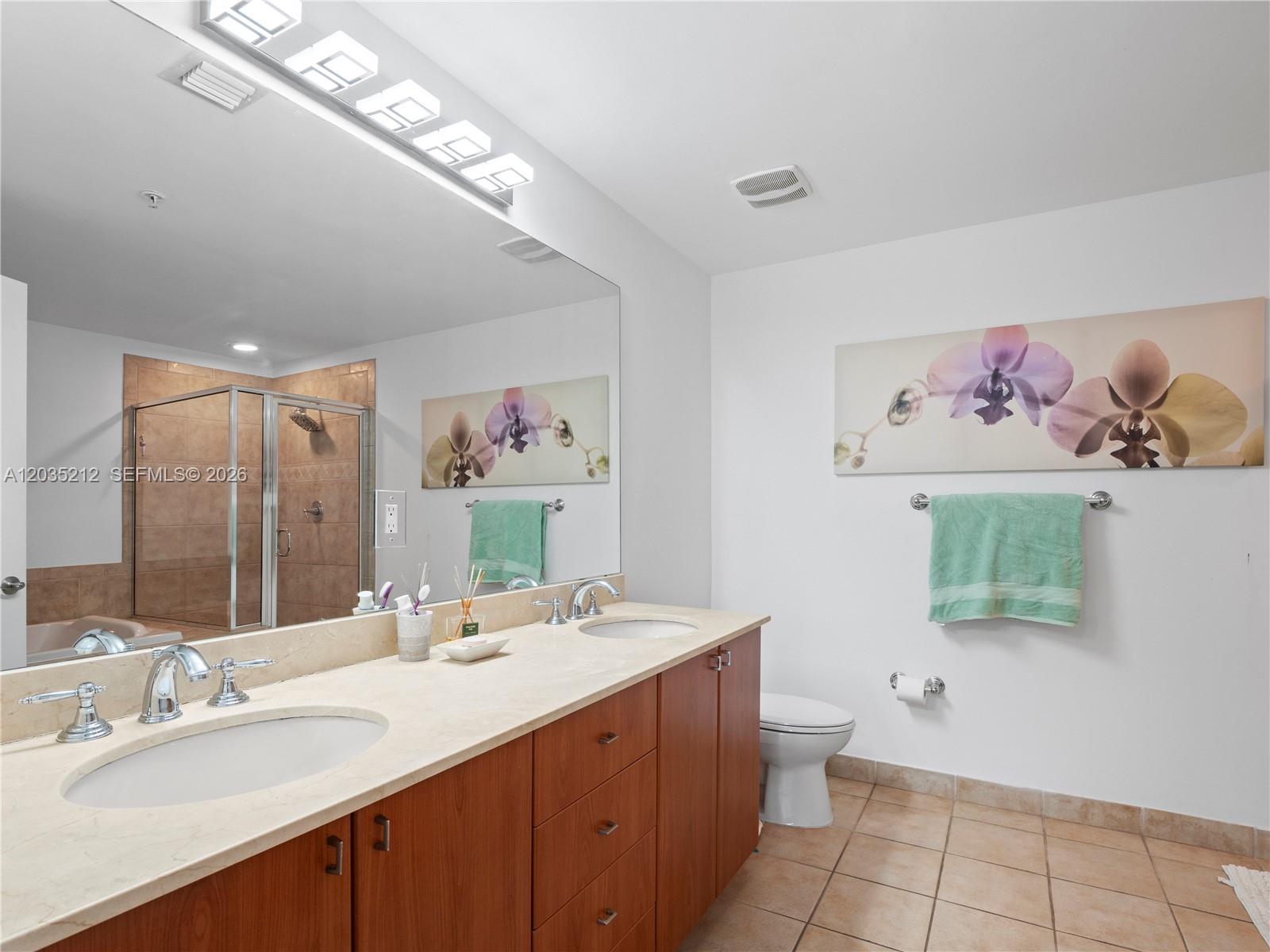 888 Douglas Road, Unit 302 Coral Gables, FL 33134 - Photo 6 of 51 MASTER BATHROOM WITH DOBLE SINKS, SEPARATE SHOWER & JACUZZI