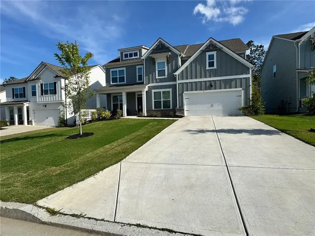a front view of house with yard