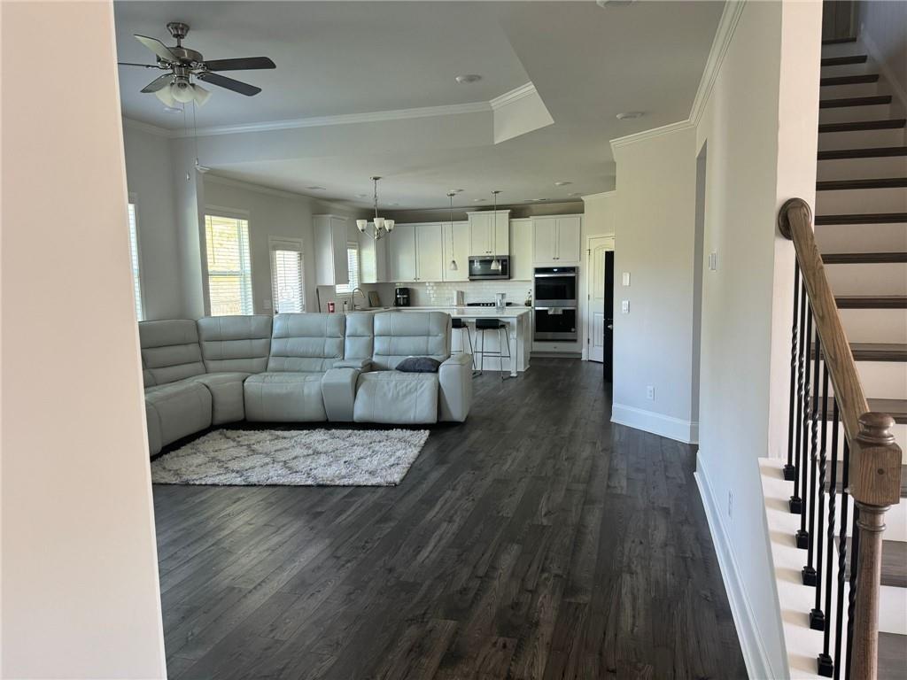 267 Citrine Way Acworth, GA 30101 - Photo 6 of 16 a living room with furniture and a wooden floor