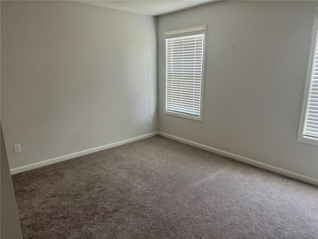 267 Citrine Way Acworth, GA 30101 - Photo 10 of 16 an empty room with a window
