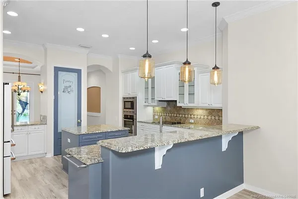 $1,430,000 | 221 Southwest Lake Rush Court, Palm City, FL 34990