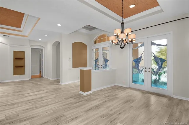 an aerial view of multiple houses with yard