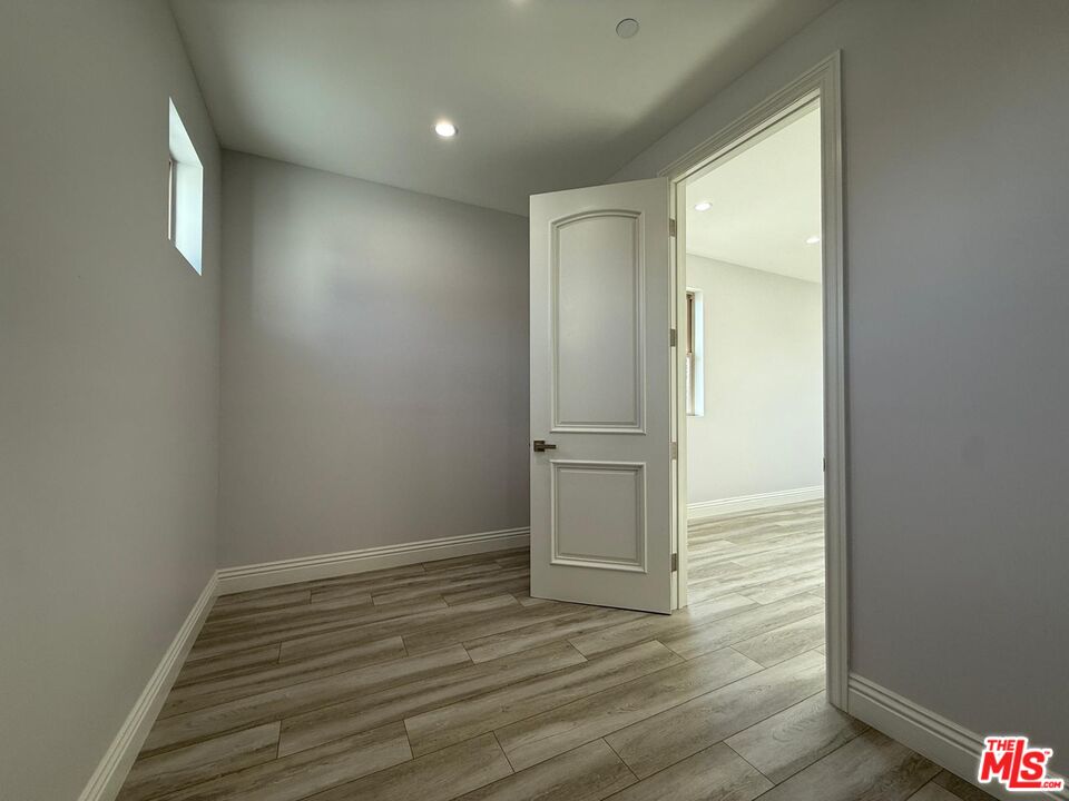 6717 Sunnyslope Avenue Van Nuys, CA 91401 - Photo 20 of 43 wooden floor in an empty room
