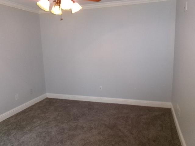 507 Falling Water Circle Bossier City, LA 71112 - Photo 13 of 15 a view of an empty room with a chandelier fan