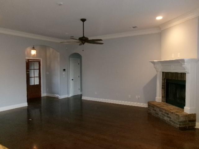 507 Falling Water Circle Bossier City, LA 71112 - Photo 5 of 15 a view of a livingroom with wooden floor and a fireplace