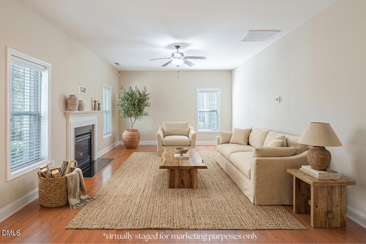 403 Rolling Pines Drive Spring Lake, NC 28390 - Photo 15 of 56 a living room with furniture and a fireplace